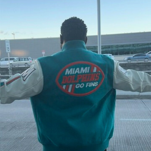 Sean Reed McGee using a Miami Dolphin Jacket